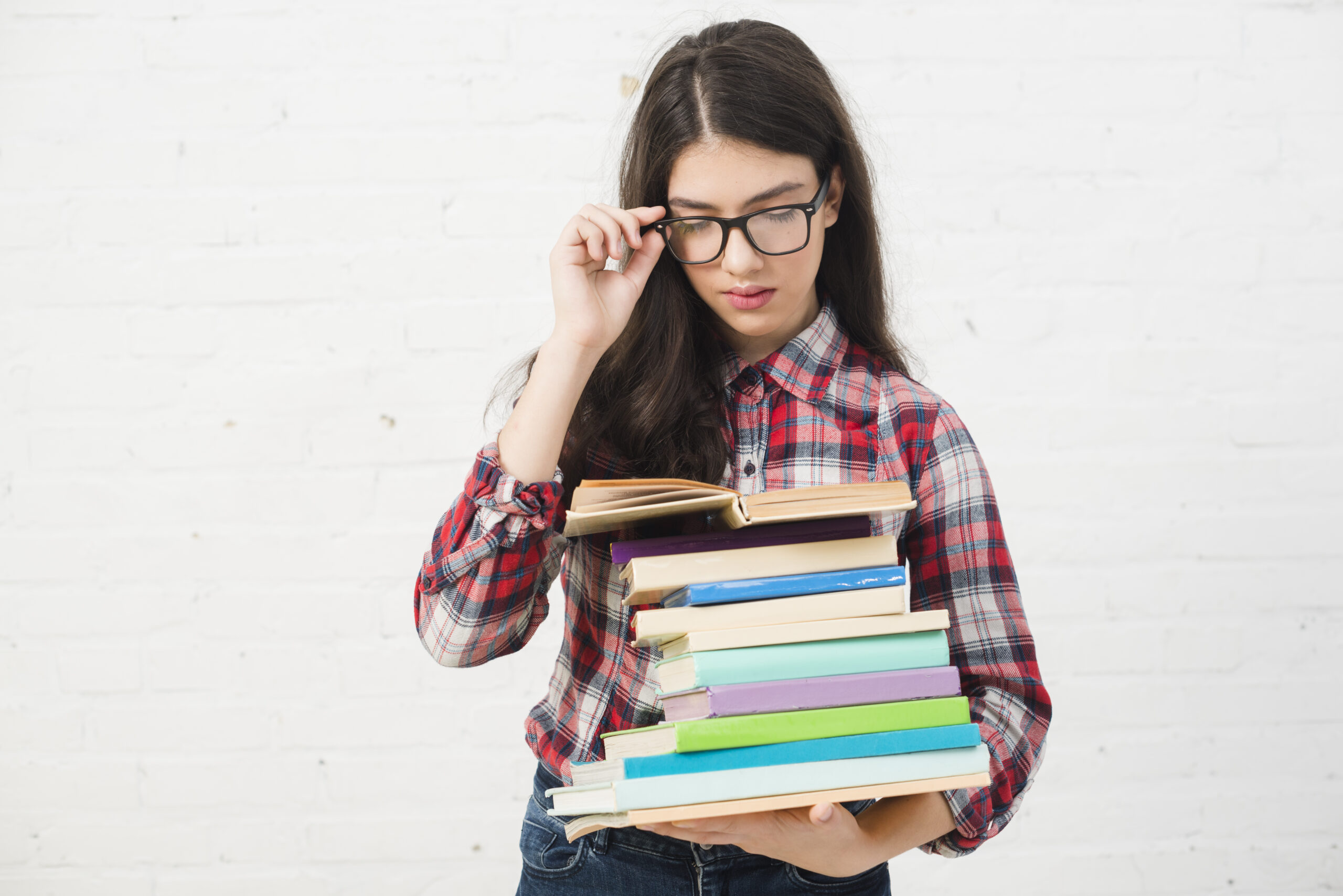 portrait-teenage-girl-with-stack-books (1)